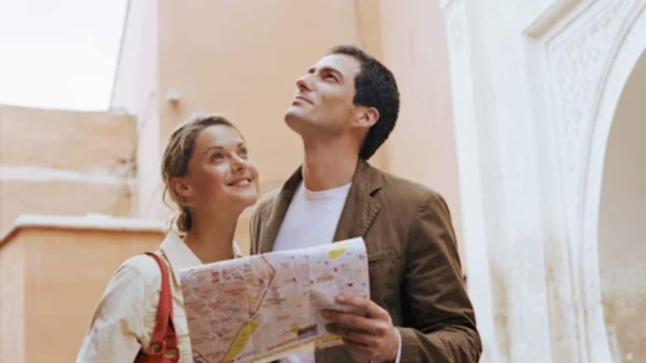 Couple discussing a trip together.