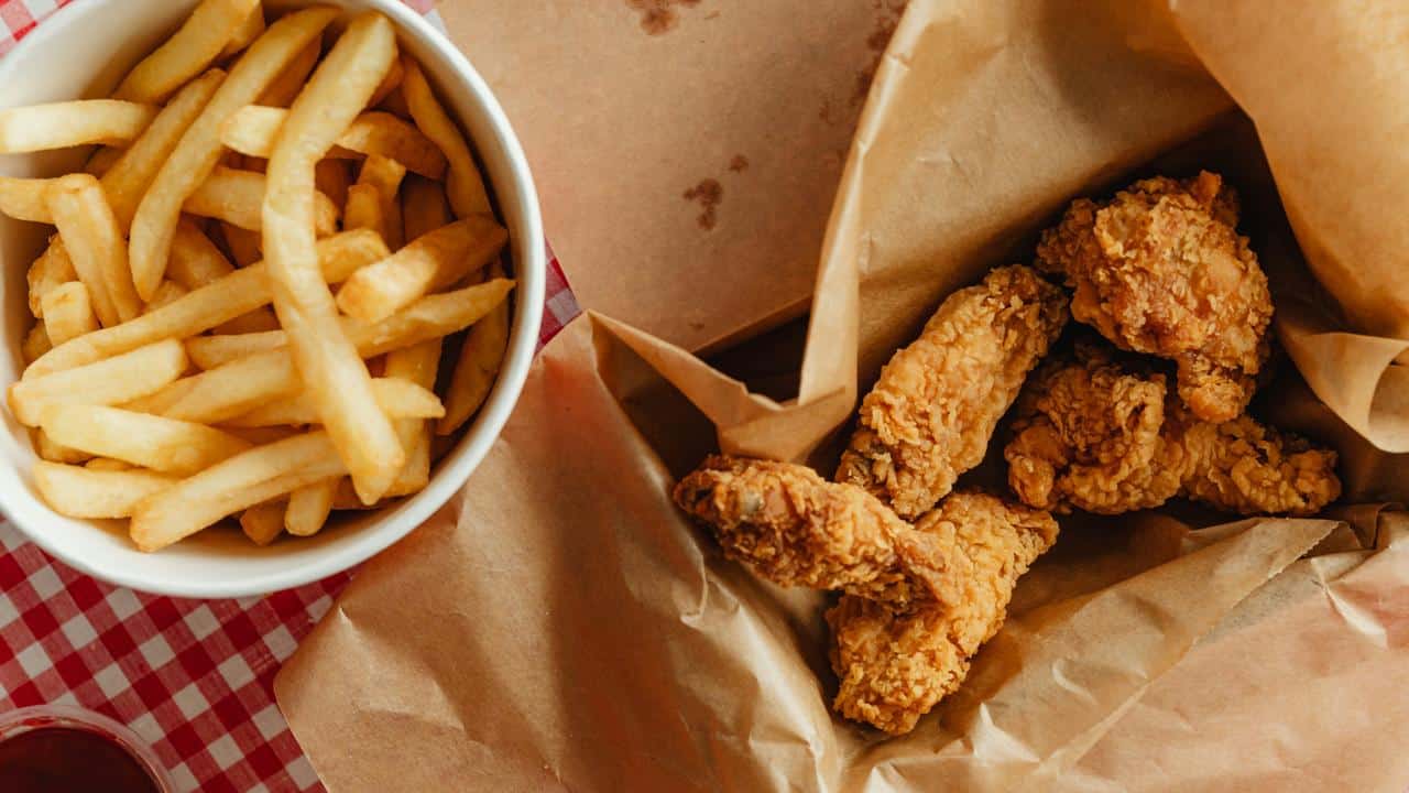 A serving of fried chicken and fries.