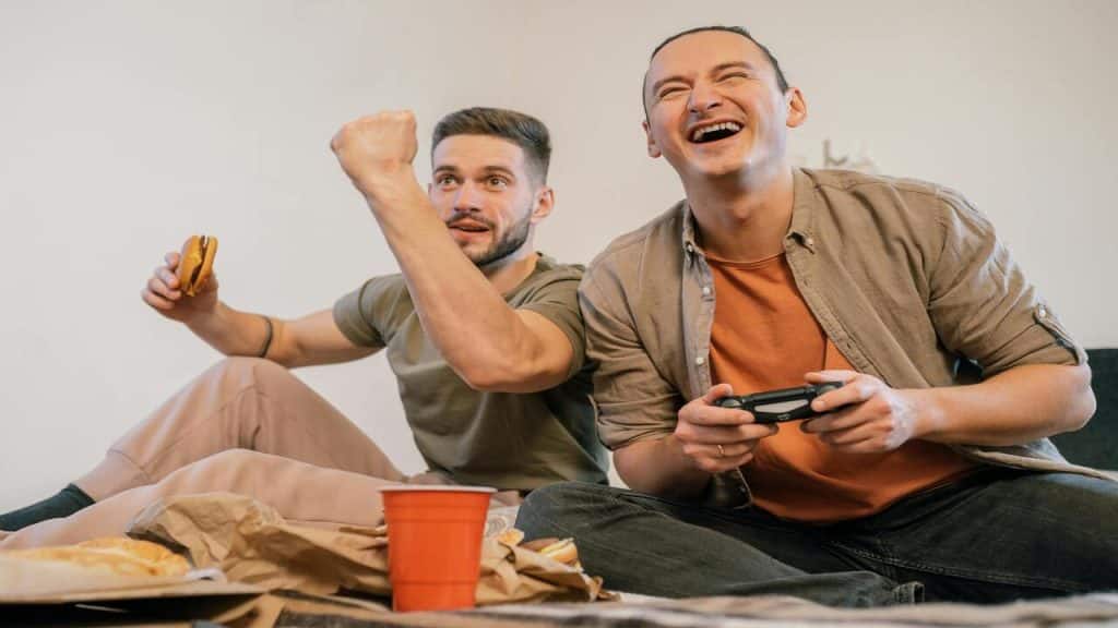 Friends playing video games.