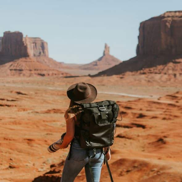 A woman exploring a picturesque desert.