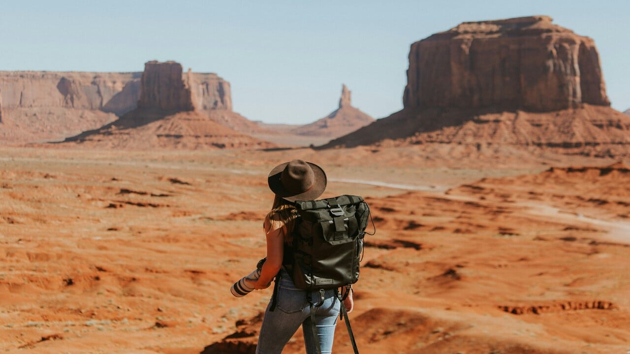 A woman exploring a picturesque desert.