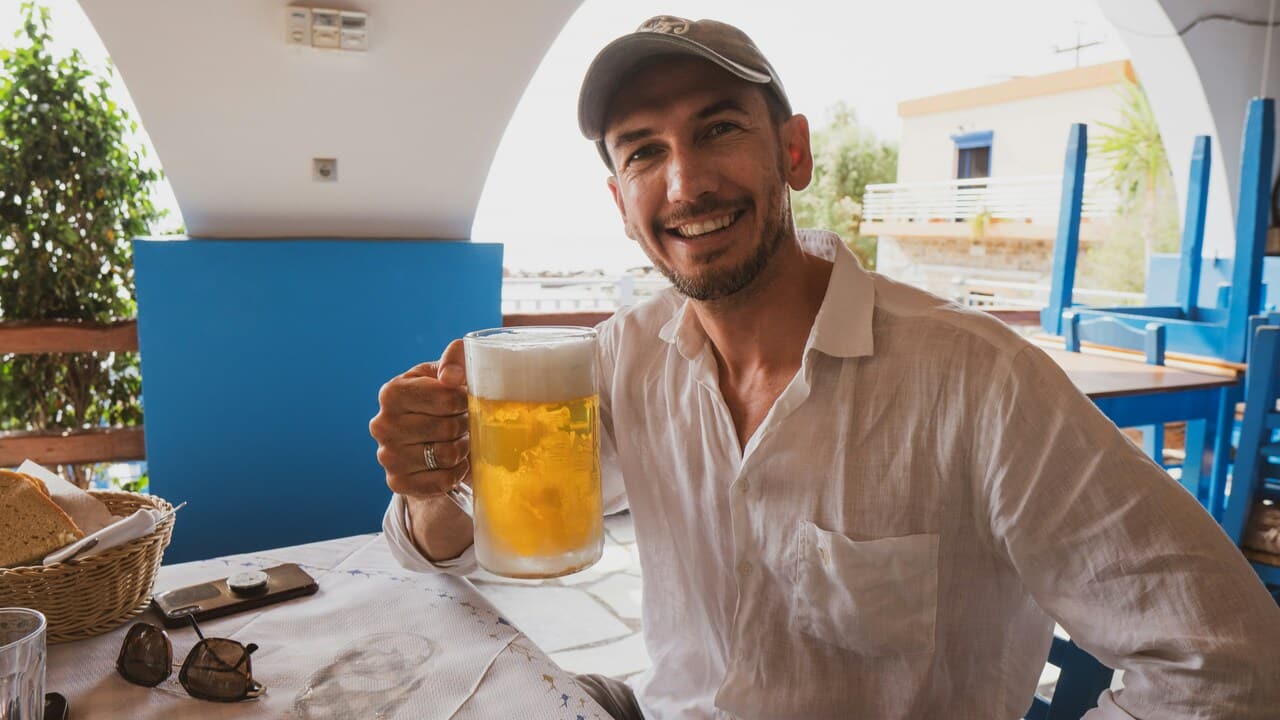 A man enjoying a beer by himself.