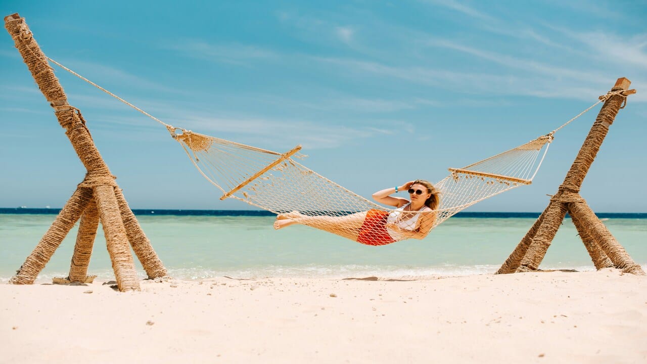 A woman on a hammock.