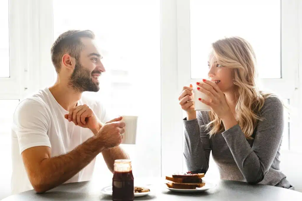 A man and woman looking at each other