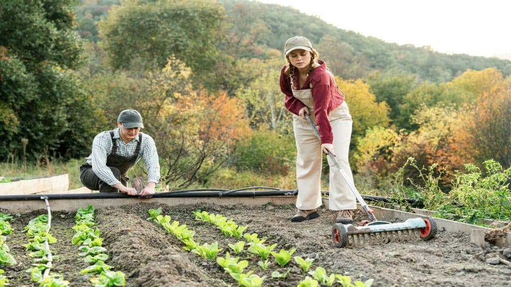 A couple gardening.