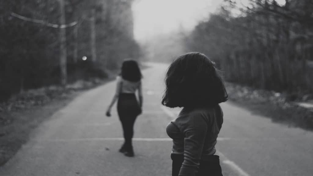 A woman looking at another woman.