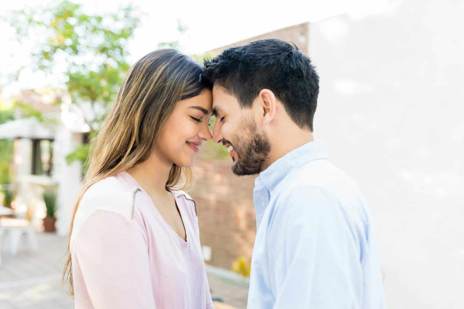 A man and woman laughing.
