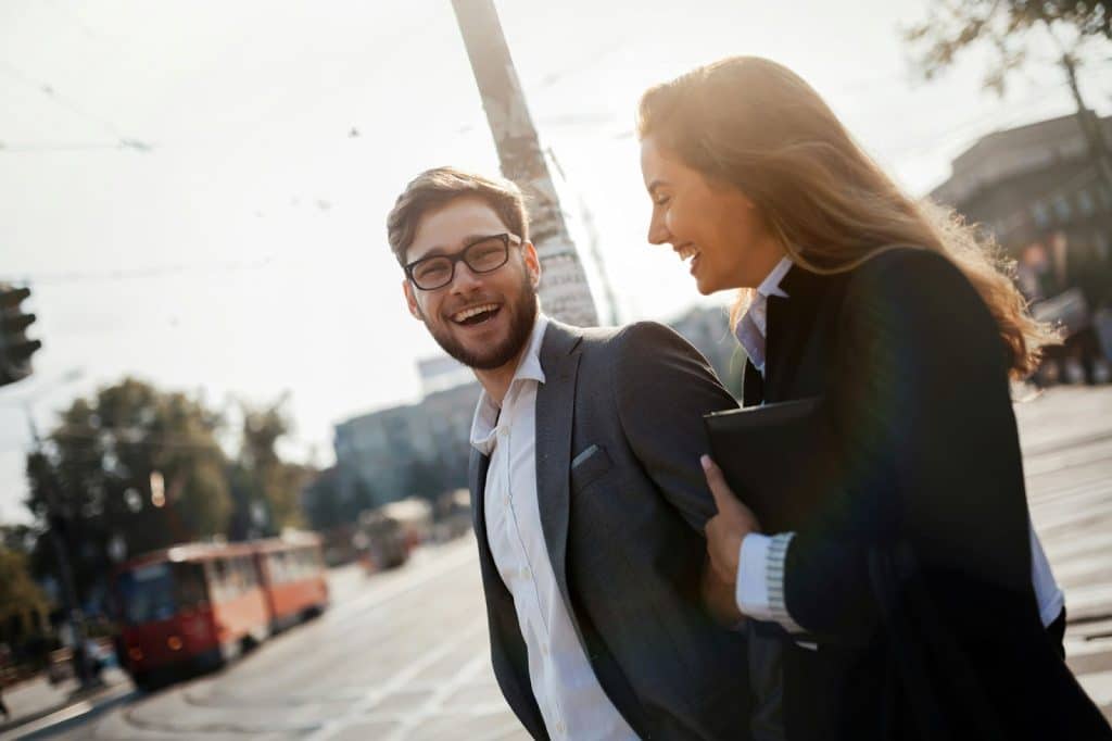 A man and woman walking.