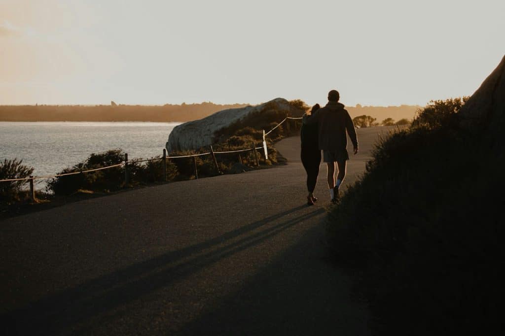 A man and woman walking.