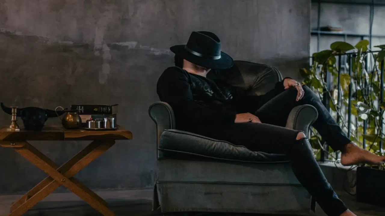 A man sleeping in public.