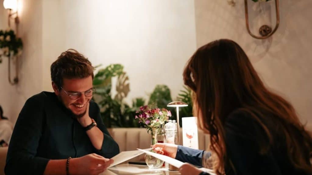 Couple having an open conversation at a casual restaurant