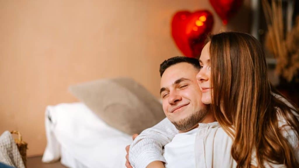 Couple embracing in quiet comfort.