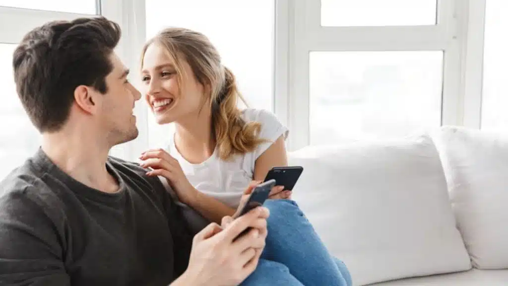 Wife trying to connect while husband is distracted.