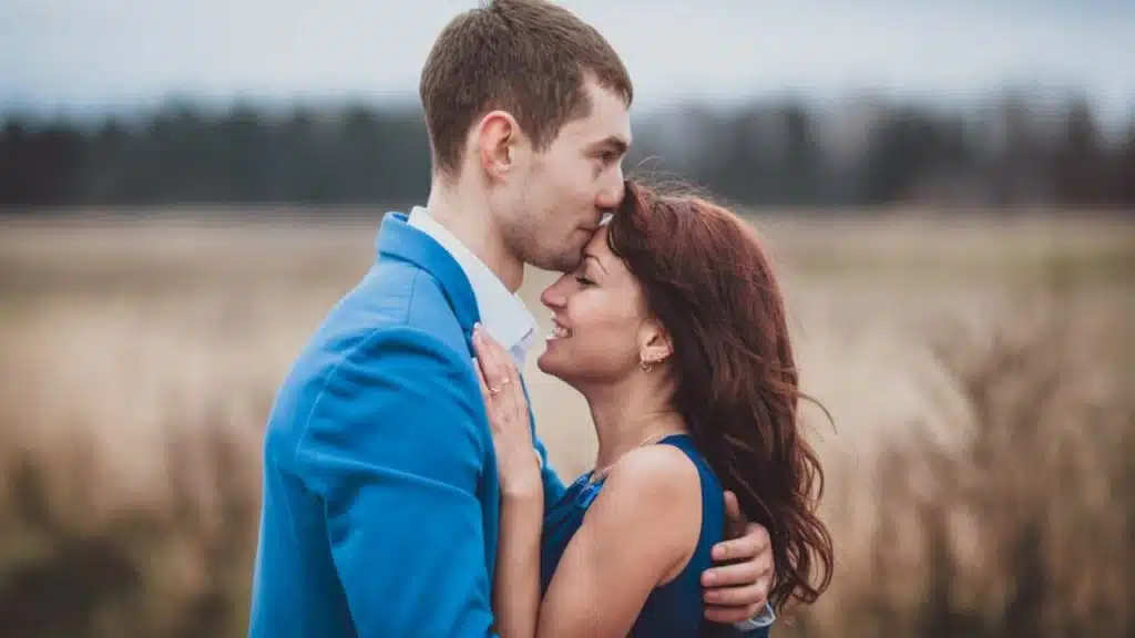 Man holding wife’s hand intentionally.