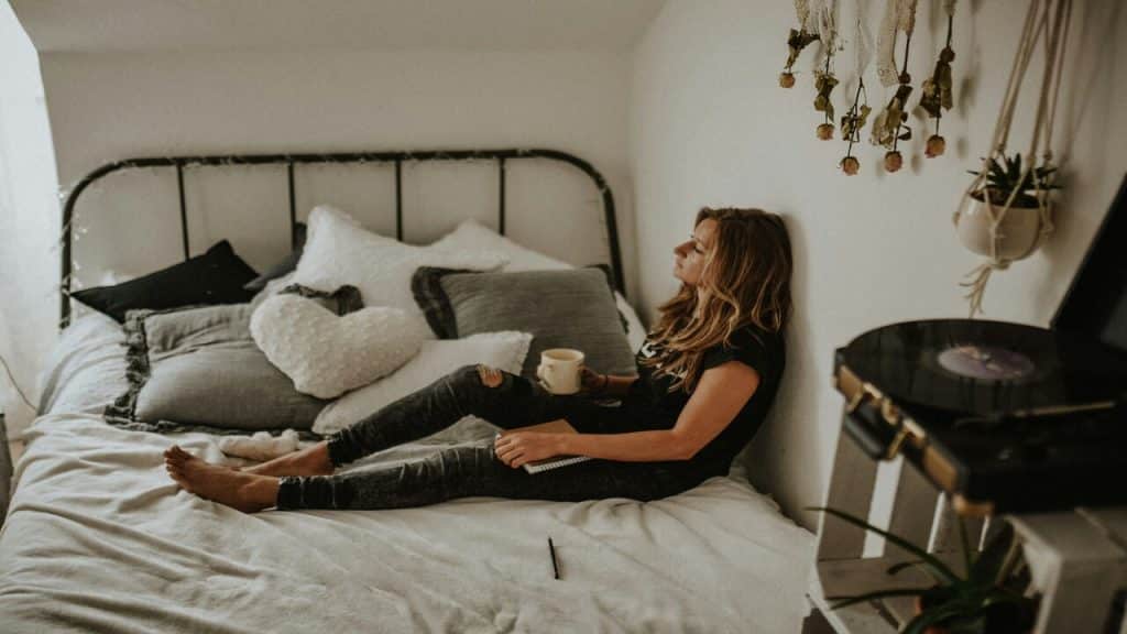 A woman looking lonely at home.
