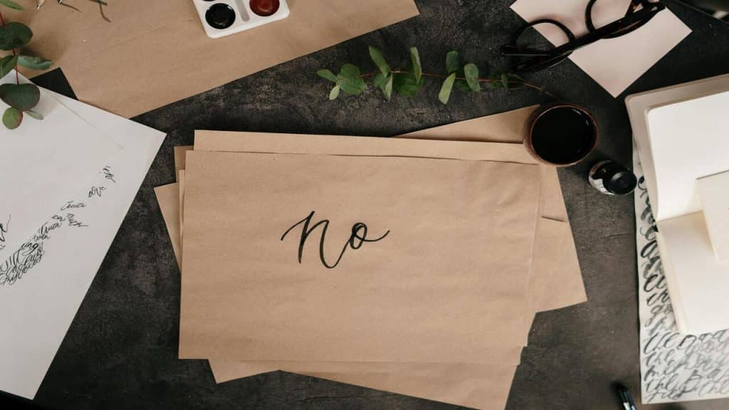 The word “no” written on paper.