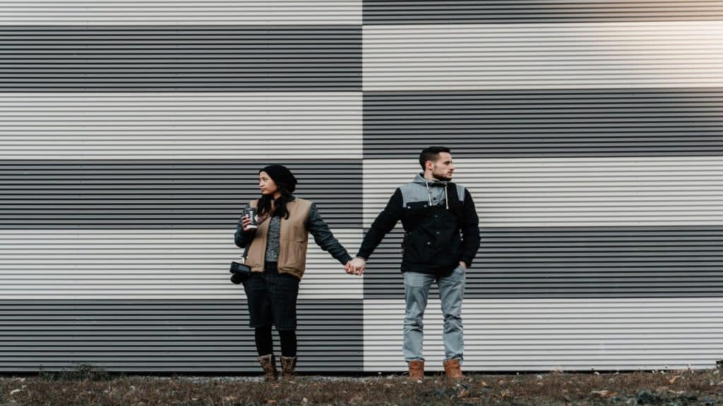 A couple not looking at each other.