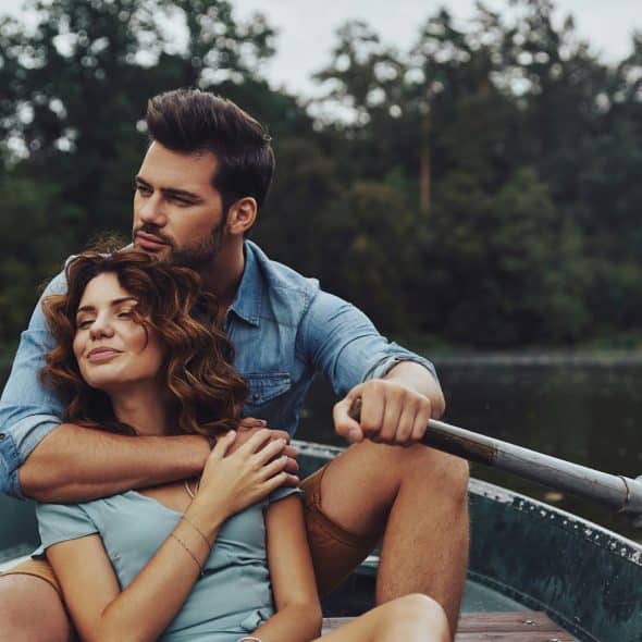 A man and woman at the boat