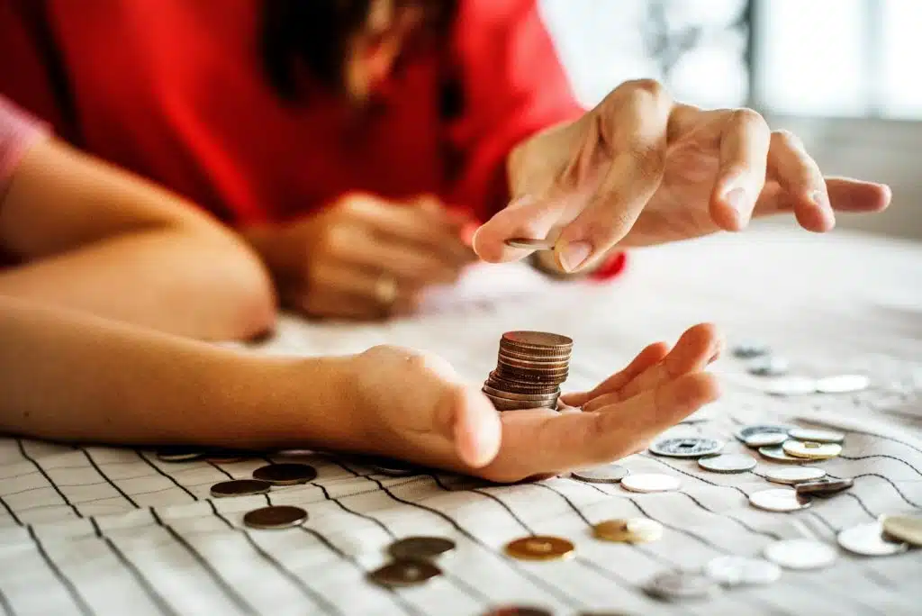 A man and woman holding money 