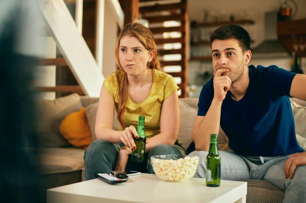 A man and woman thinking what to watch