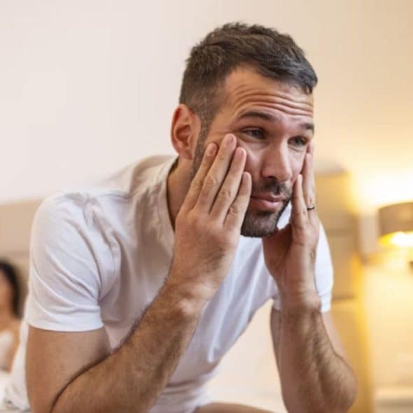 Man reflecting on his behavior, questioning his own relationship impact