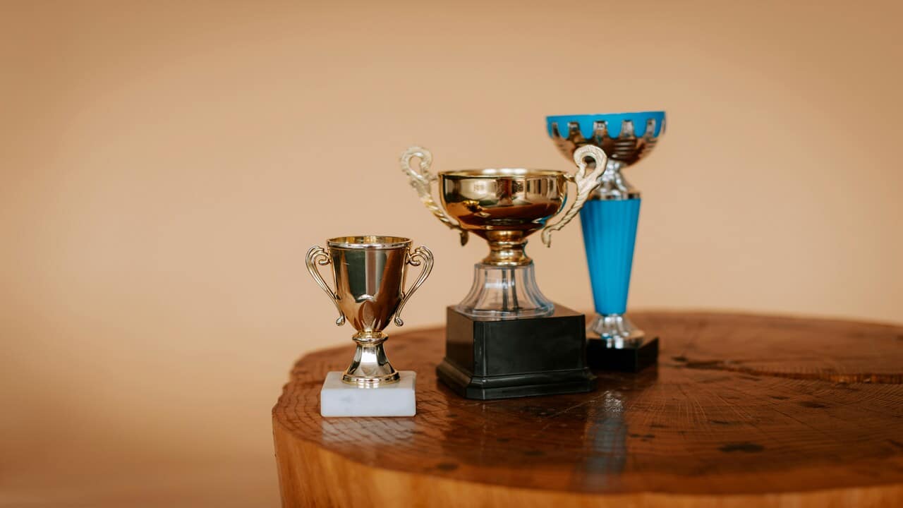 Trophies on a table.