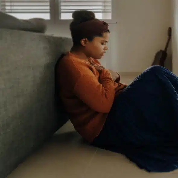 A woman anxious at home.