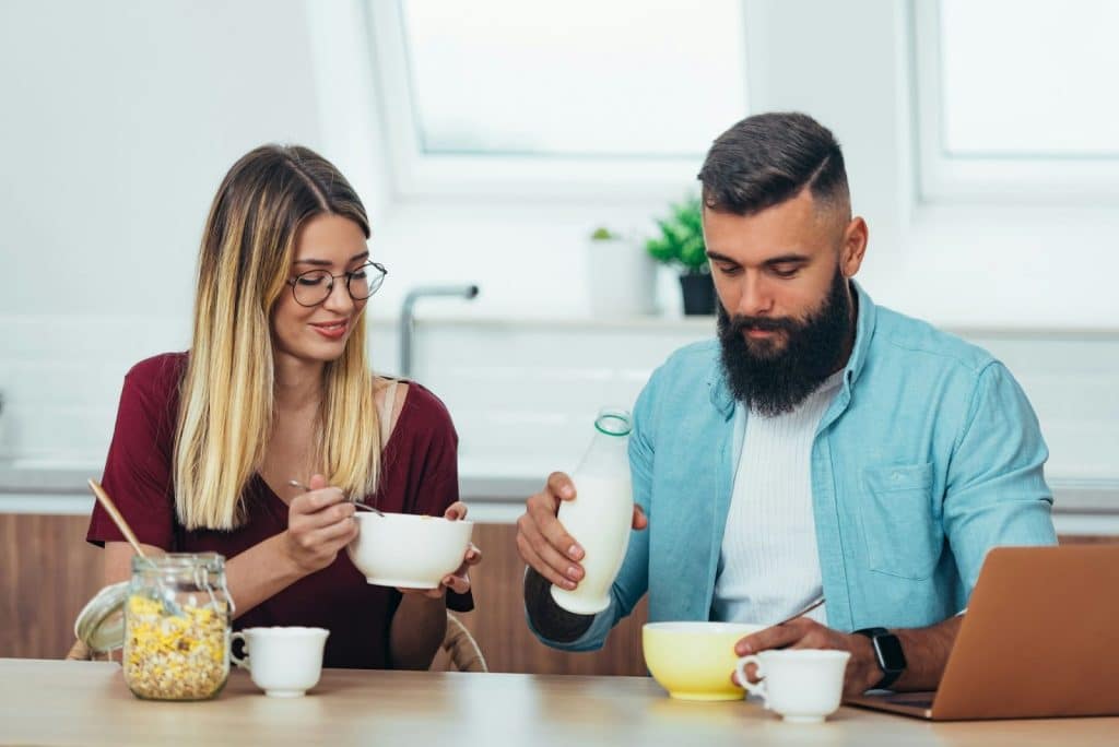 A man and woman eating
