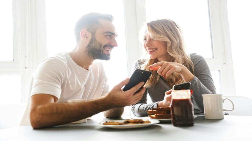 A couple having breakfast at home.