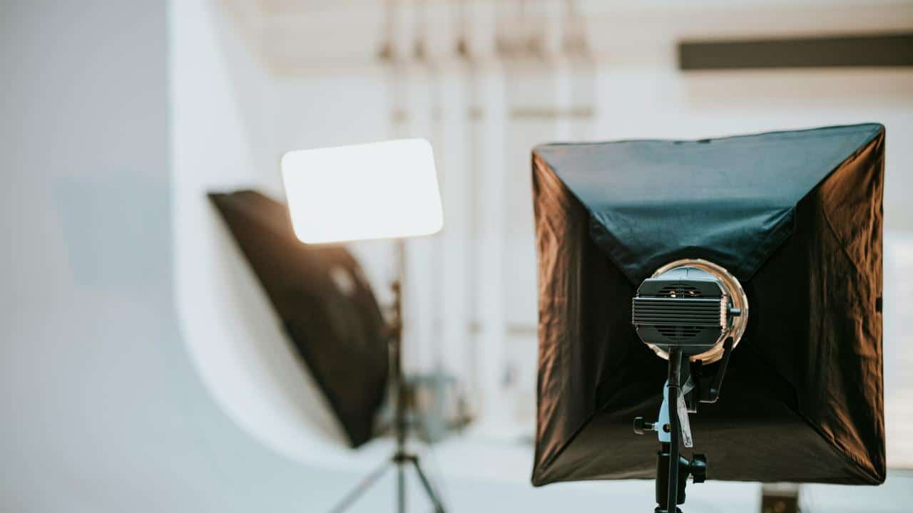 A photography studio setup with softbox lights.