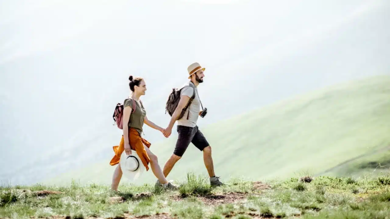 Couple enjoying a weekend hike in the mountains.