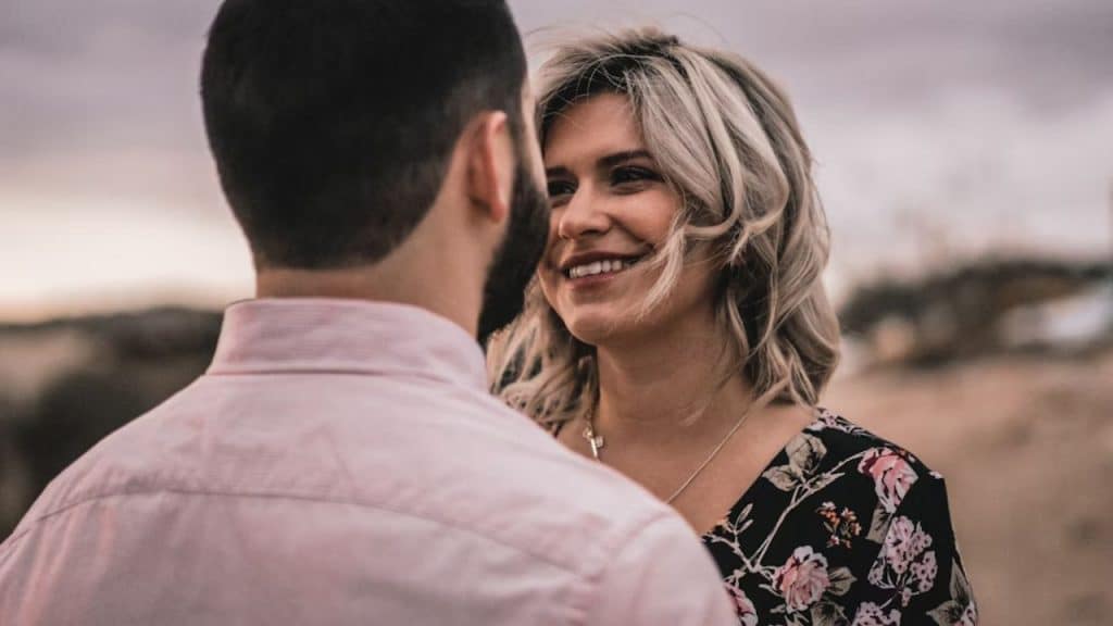 Couple smiling after resolving conflict together