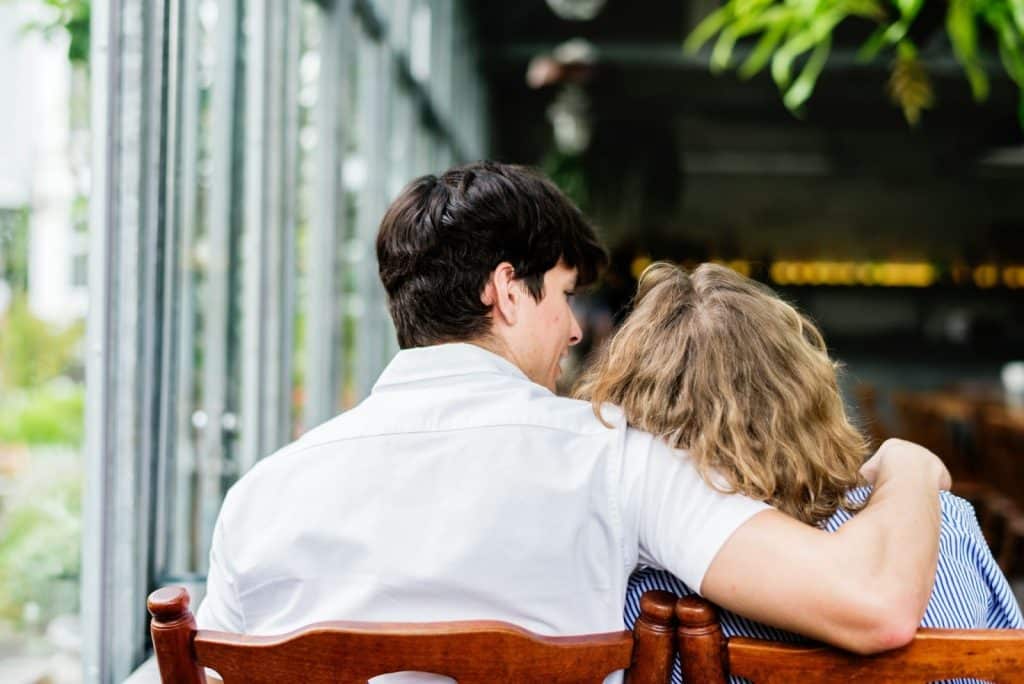 A man and woman talking