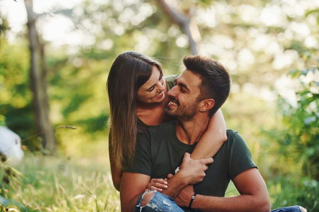 A man and woman looking at each other