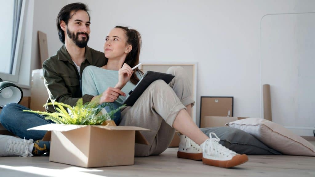 A man and woman planning with their new home