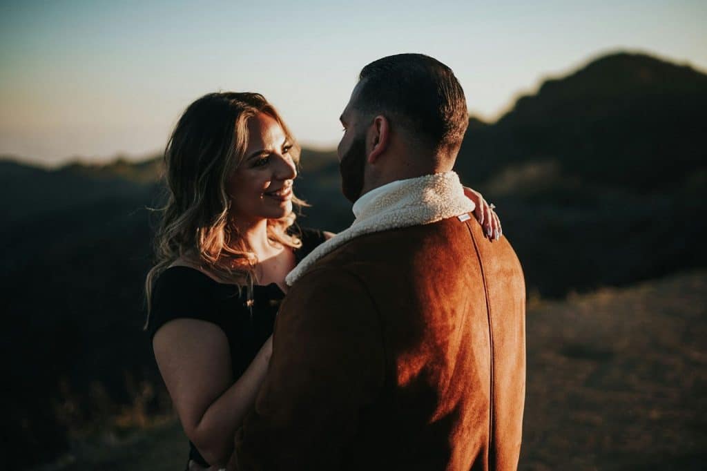 A man and woman having a moment