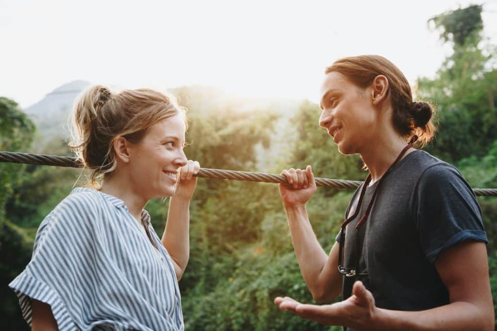 A man and woman talking