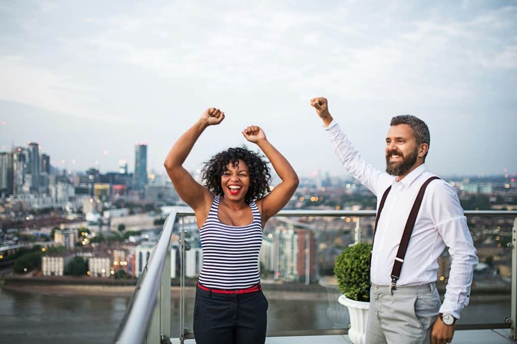 A man and woman celebrating 