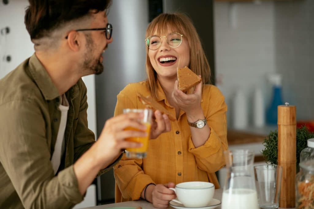 A man and woman laughing together