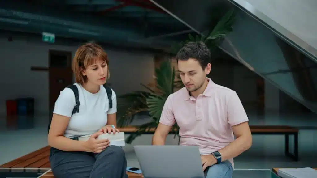 Man listening attentively while woman explains her ideas