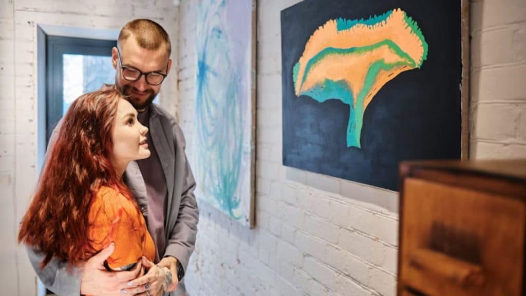 Man encouraging woman while she looks inspired