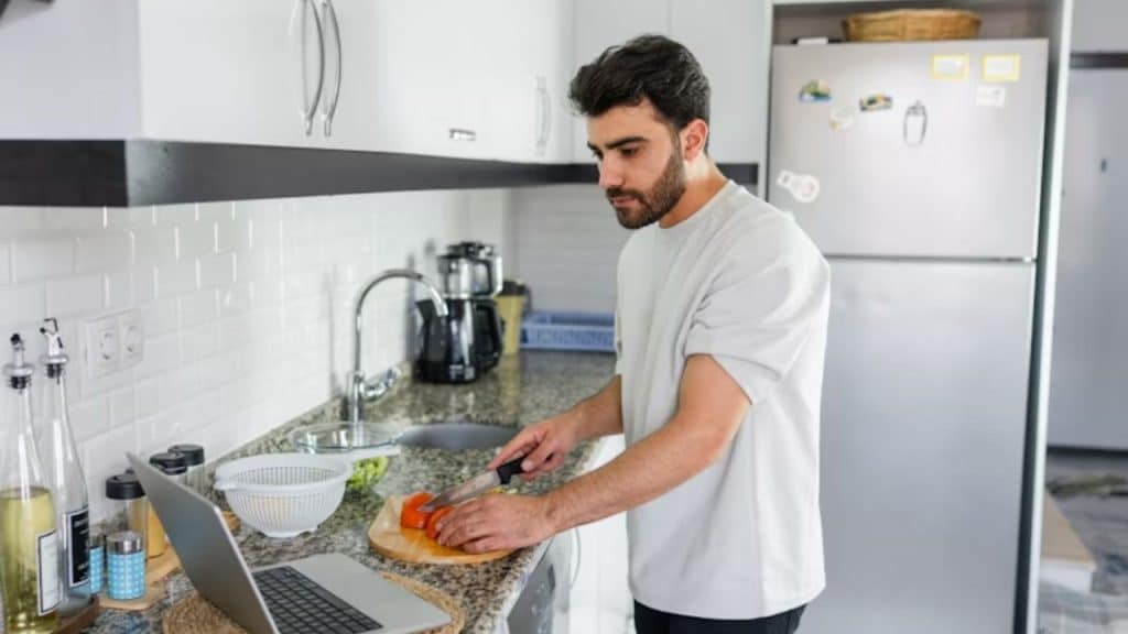 Man preparing healthy meal in modern kitchen