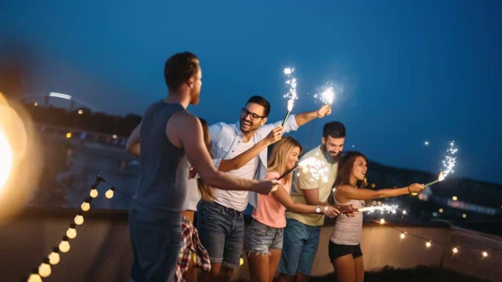 Group of friends laughing together outdoors
