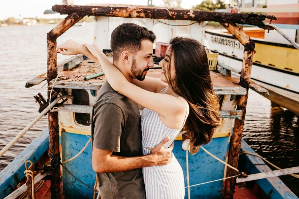 A woman hugging a man