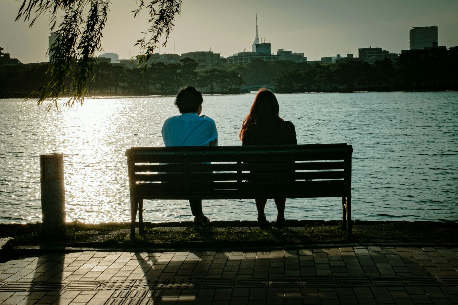 A man listening to a woman.