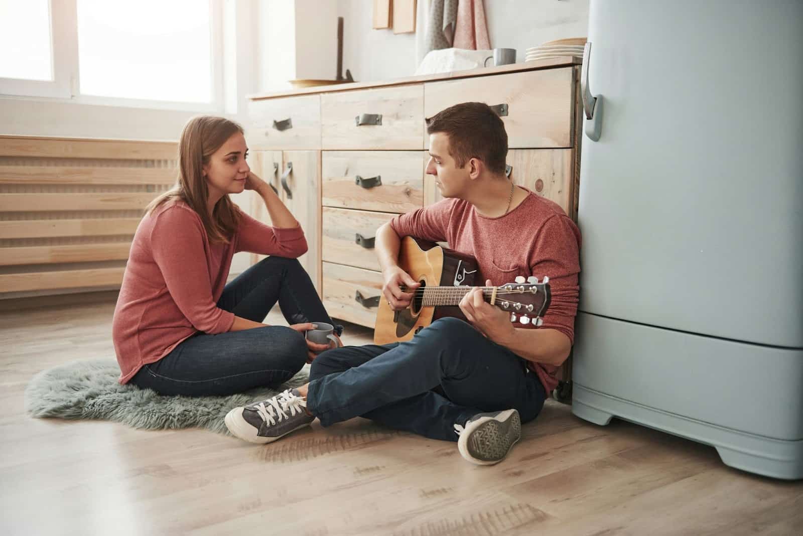 A man singing for a woman.