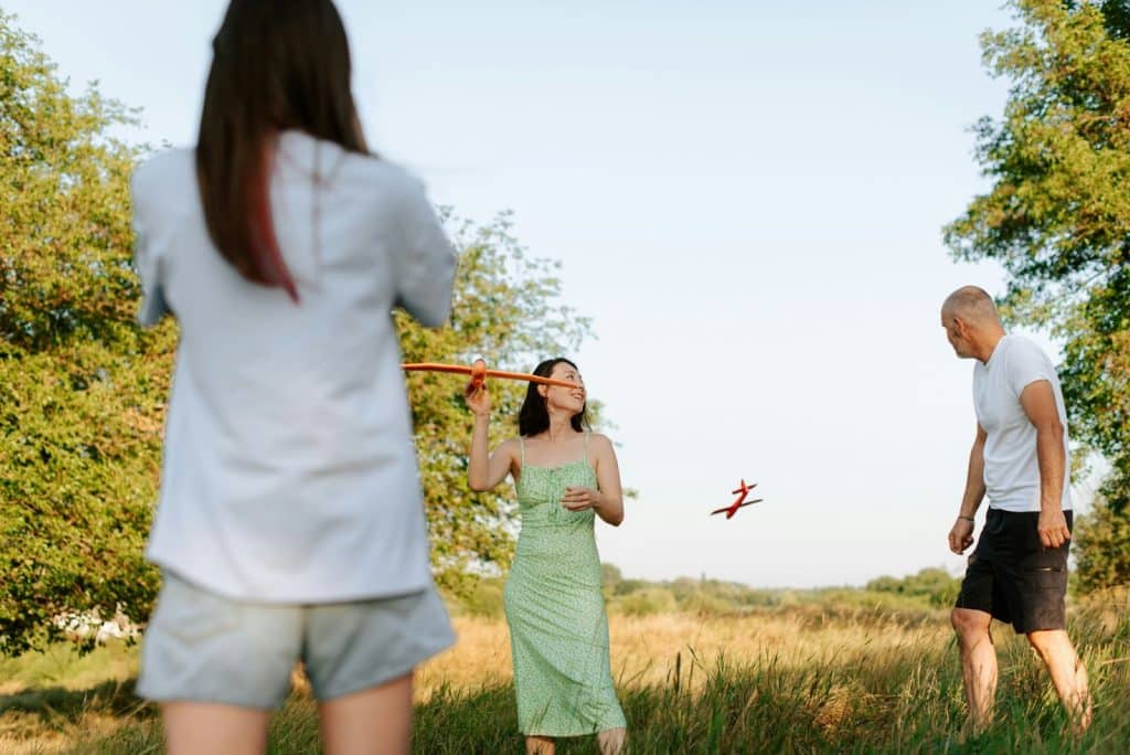 A man and woman playing frisbee