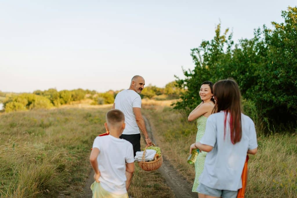 A man and woman with their children