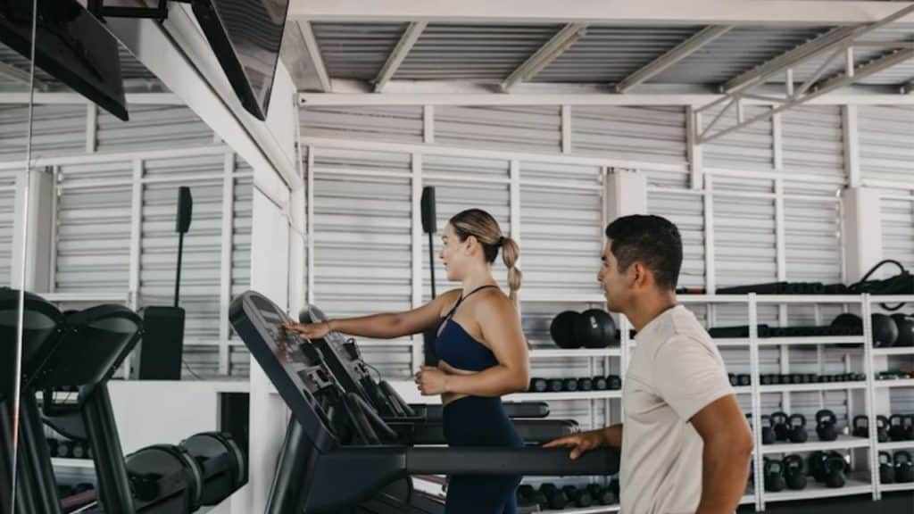 Man skipping workout to prioritize partner’s tasks
