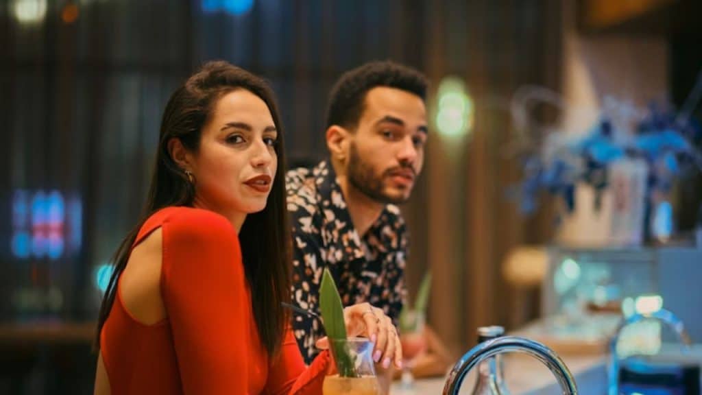 Husband and wife sitting together without speaking